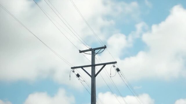 clouds fly over the electric pole