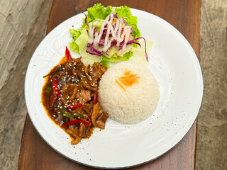 Rice beef black pepper  with salad and mayonnaise sauce