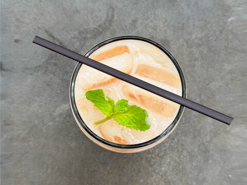 Generated Image - Summer refreshment lychee yakult drink ice cubes and view on top angle camera.