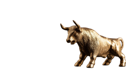 Golden bull statue against black background