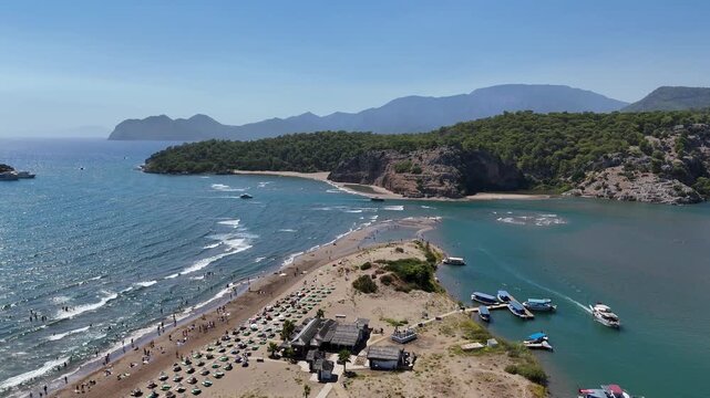 Drone view of Dalyan River (in southwestern Turkey, near Ortaca, Muğla Province) flows into the Mediterranean Sea at a place called İztuzu Beach (also known as Turtle Beach).