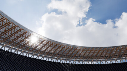 円形スタジアムの屋根ごしに見える太陽光
