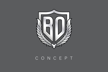 Obraz premium BD Creative Initial Letter Logo with Shield and Laurel Wreath Silver Metallic Branding Emblem on Gray Background.