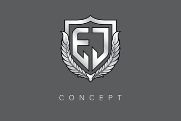 Obraz premium EJ Creative Initial Letter Logo with Shield and Laurel Wreath Silver Metallic Branding Emblem on Gray Background.