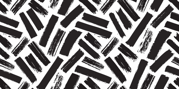 Abstract black brush strokes on a white background seamless pattern for creative design