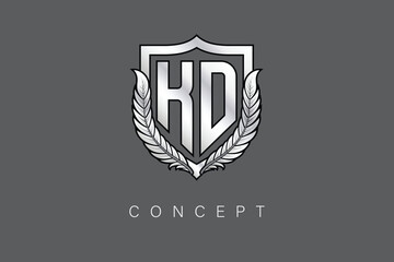 KD Creative Initial Letter Logo with Shield and Laurel Wreath Silver Metallic Branding Emblem on Gray Background.