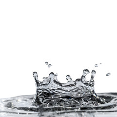 Captivating water splash in high definition against a stark black backdrop