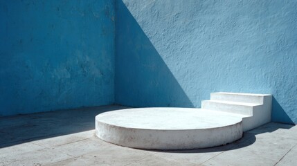Clean interior design of a contemporary luxury bathroom with a blue armchair and a bathtub
