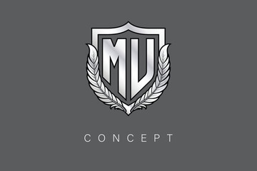 MU Creative Initial Letter Logo with Shield and Laurel Wreath Silver Metallic Branding Emblem on Gray Background.