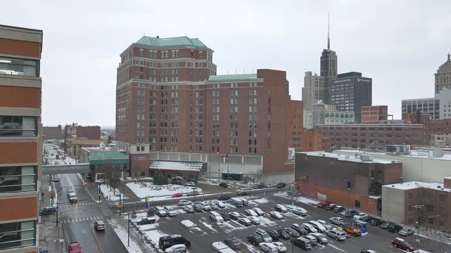 Buffalo, New York during an early winter December snow. Looking east down West Huron Street from Franklin Street.