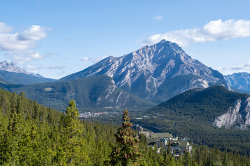 Majestic mountain range displays stunning wilderness in a clear blue sky setting