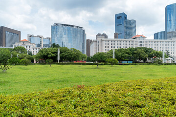 Obraz premium city park with modern building background in shanghai