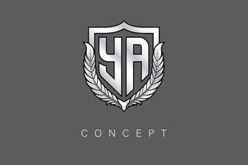 YA Creative Initial Letter Logo with Shield and Laurel Wreath Silver Metallic Branding Emblem on Gray Background.