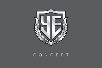 YE Creative Initial Letter Logo with Shield and Laurel Wreath Silver Metallic Branding Emblem on Gray Background.