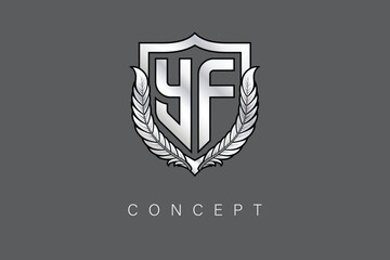 YF Creative Initial Letter Logo with Shield and Laurel Wreath Silver Metallic Branding Emblem on Gray Background.