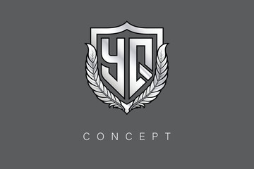 YQ Creative Initial Letter Logo with Shield and Laurel Wreath Silver Metallic Branding Emblem on Gray Background.