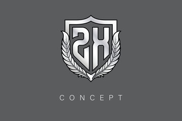 ZX Creative Initial Letter Logo with Shield and Laurel Wreath Silver Metallic Branding Emblem on Gray Background.