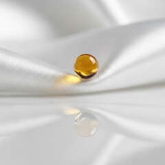 Amber Droplet on Luxurious White Silk Fabric