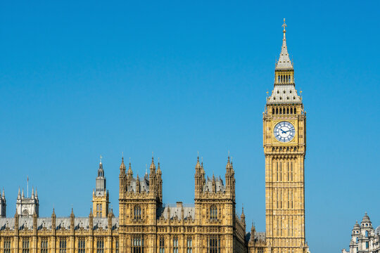 Big Ben and Houses of Parliament with Westminster Bridge and River Thames in London