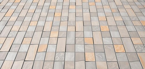 Geometric pattern of grey and beige stone slabs forming a floor,  modern,  building