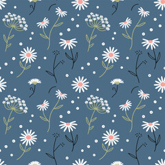 Delicate floral pattern with daisies and wildflowers on blue