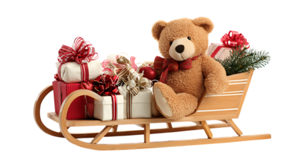 Teddy bear in a wooden sleigh with christmas gifts isolated on transparent background.