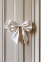 Elegant white satin bow tied on a decorative cabinet door, showcasing intricate details and textures, enhancing the aesthetic appeal of the interior design concept
