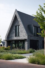 Modern A-Frame House with Stone Exterior and Lush Landscaping