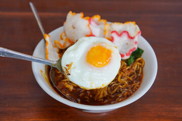 Mie Rantau, captured on September 4, 2025. Traditional Indonesian noodle dish served with half-cooked fried egg, rich flavor and authentic local culinary heritage