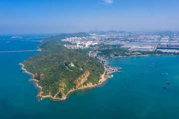 Aerial top view over international cargo ship at industrial import-export port prepare to load...