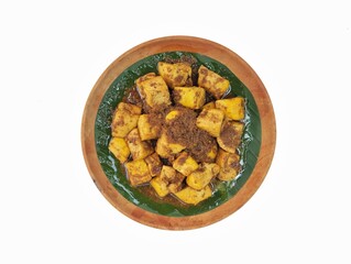 Tahu bumbu kecap or Indonesian food made from tofu with spices and soy sauce  on wooden plate isolated on white background, Flat lay 