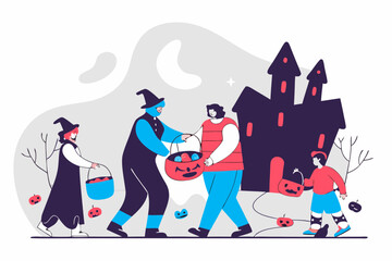 Children in halloween costumes trick-or-treating at spooky haunted house