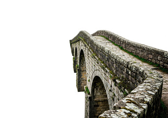 Obraz premium Stone arch bridge on a white background. Space for text.
