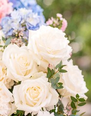 Close-up of creamy white roses and hydrangeas
