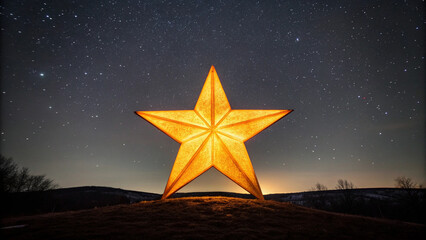 Large illuminated five-pointed star against a starry night sky stars astronomy