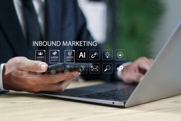 Inbound marketing strategy concept. Creating attraction for customer groups with AI technology. Businessman working with inbound marketing icon on virtual screen.