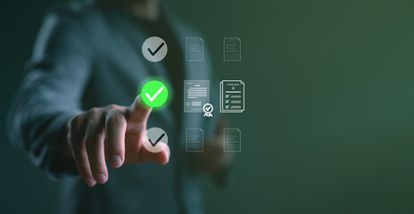 Businessman validating digital documents with green check mark symbol. Concept of certification,...
