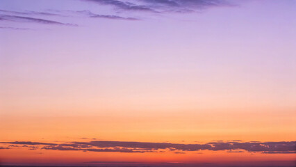 Fototapeta premium Soft Gradient Sky with Pastel Hues of Purple, Pink, and Orange at Sunset twilight