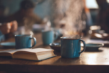 Fototapeta premium A café setting with steaming mugs of coffee as a book club debates themes. The mood feels lively and conversational