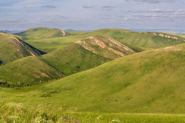 Obraz premium Magnificent landscape of the Karama Runtau ridge at sunset on a spring day