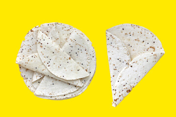 Quinoa tortilla wraps on yellow background