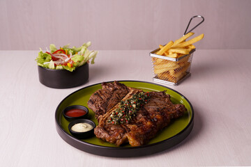 Grilled Bife de Chorizo with Chimichurri, French Fries and Salad