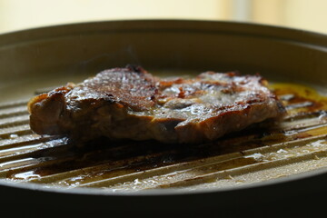 meat steak grill on pan in the kitchen