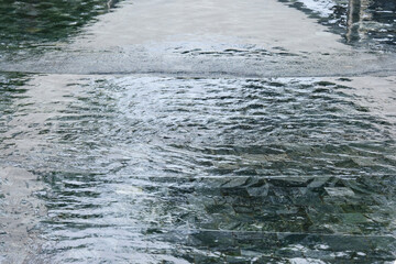 water flowing into the water