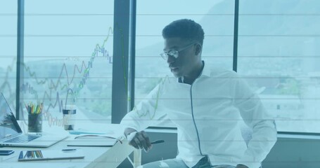 Animation of data processing over african american businessman thinking - Powered by Adobe