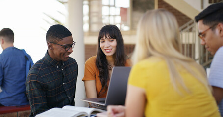 Happy people, students or laptop with research on campus for group project or assignment. College, friends and smile with computer or textbooks on break for study material or team assessment together