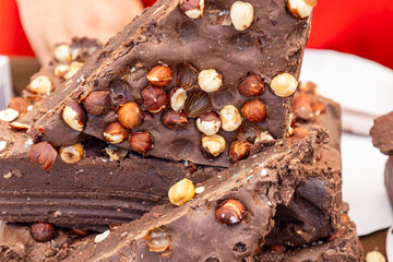 Handmade chocolate fudge with hazelnuts.