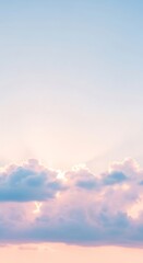 Obraz premium Pastel sky dreams: Gentle hues blending across cloudscape create a tranquil and ethereal ambiance