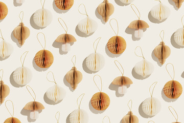 Top view of Christmas Ornaments from Paper, New Year minimal trend pattern, winter season holiday decorations as flashlights, balls, mushroom white beige brown color. Happy holidays, Merry Christmas