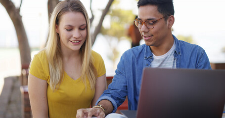 Students, team and discussion with reading outdoor for education, learning and laptop for...